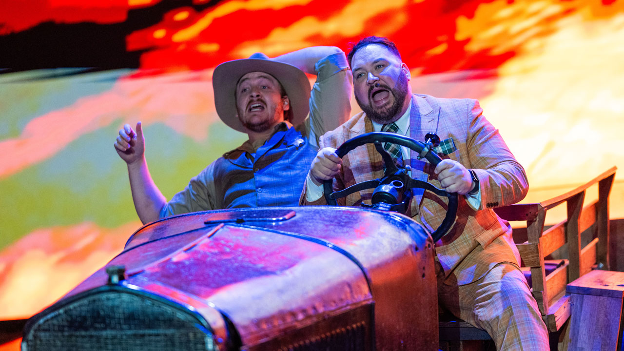 Two actors arrive in the car during the show.