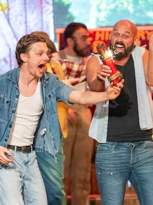 Two McCoy sons hand over dynamite. 