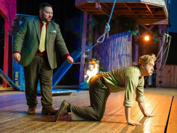 A man with his pants on fire