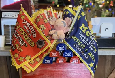 flags and a stuffed pig in the gift shop